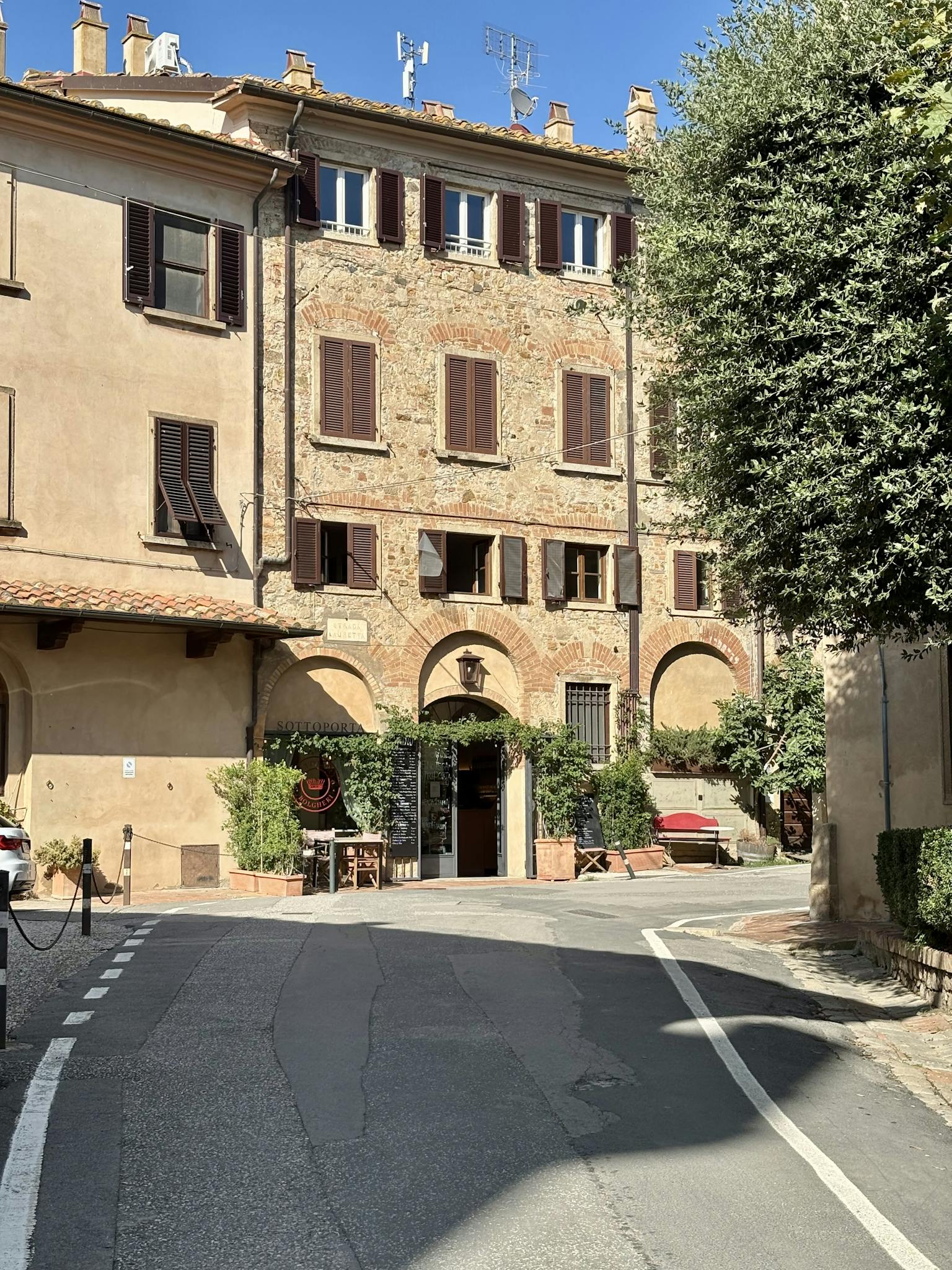 Explore the picturesque streets of Bolgheri, Tuscany. Perfect for travel enthusiasts and wine lovers.